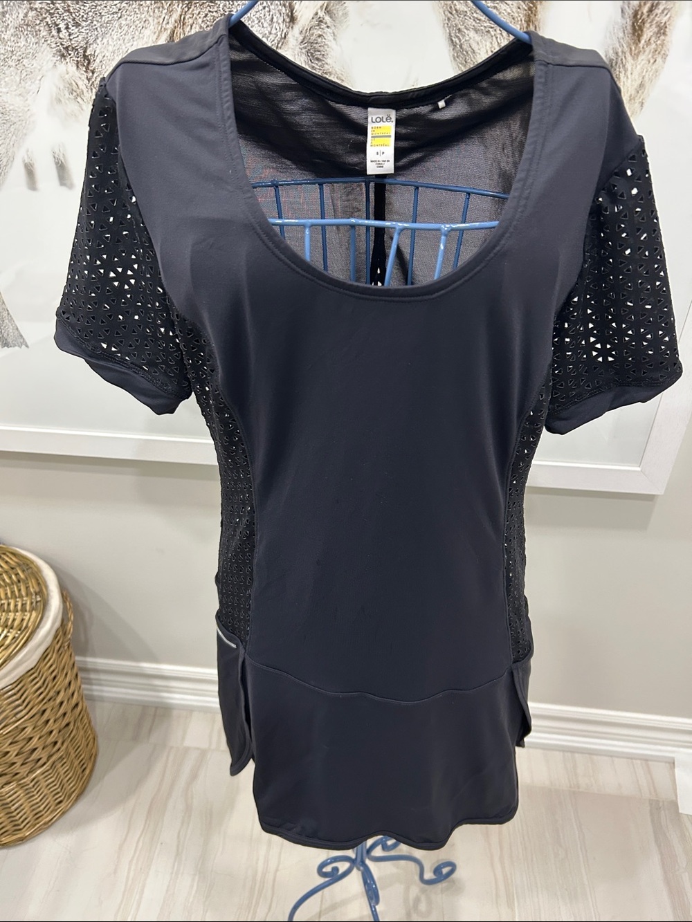 Lole tunic top with laser cut detail in back and sleeves. Size small